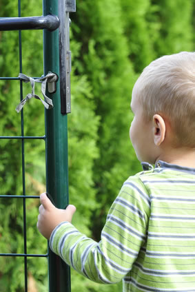 child near gate