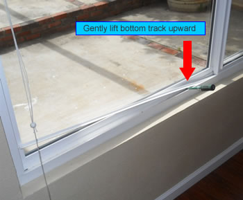 removing bottom track from vinyl window